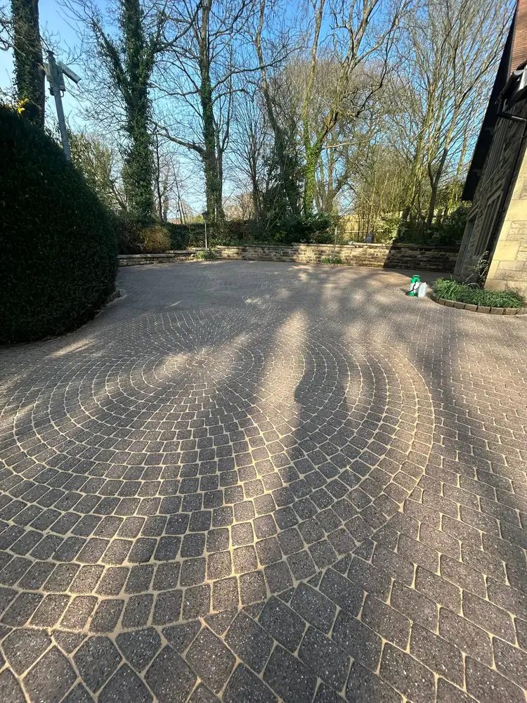 Driveway cleaning on patterned paving by Murphy's Cleaning Services